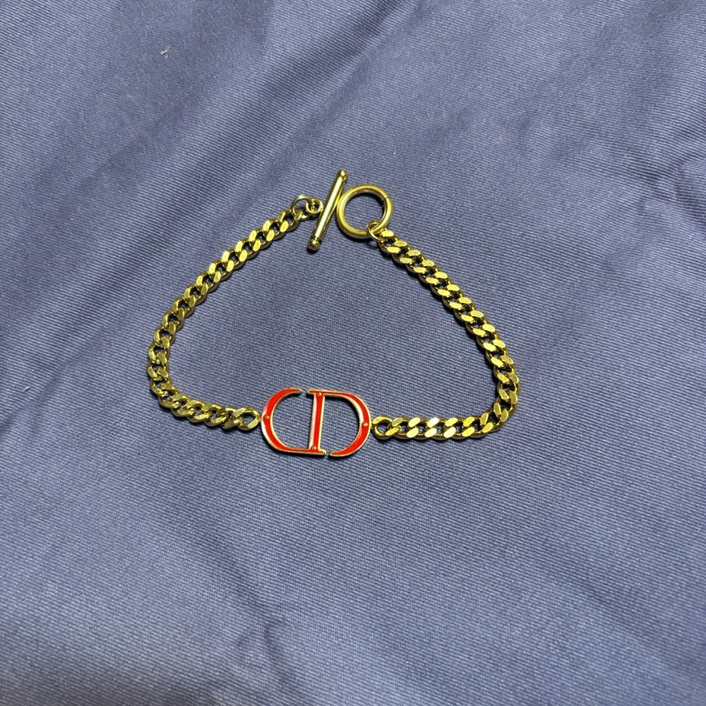 Gold Chain Bracelet with Red Accent